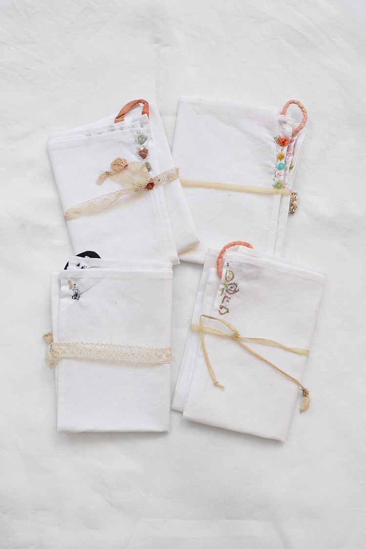 Vintage napkins with hand embroidered accents.
