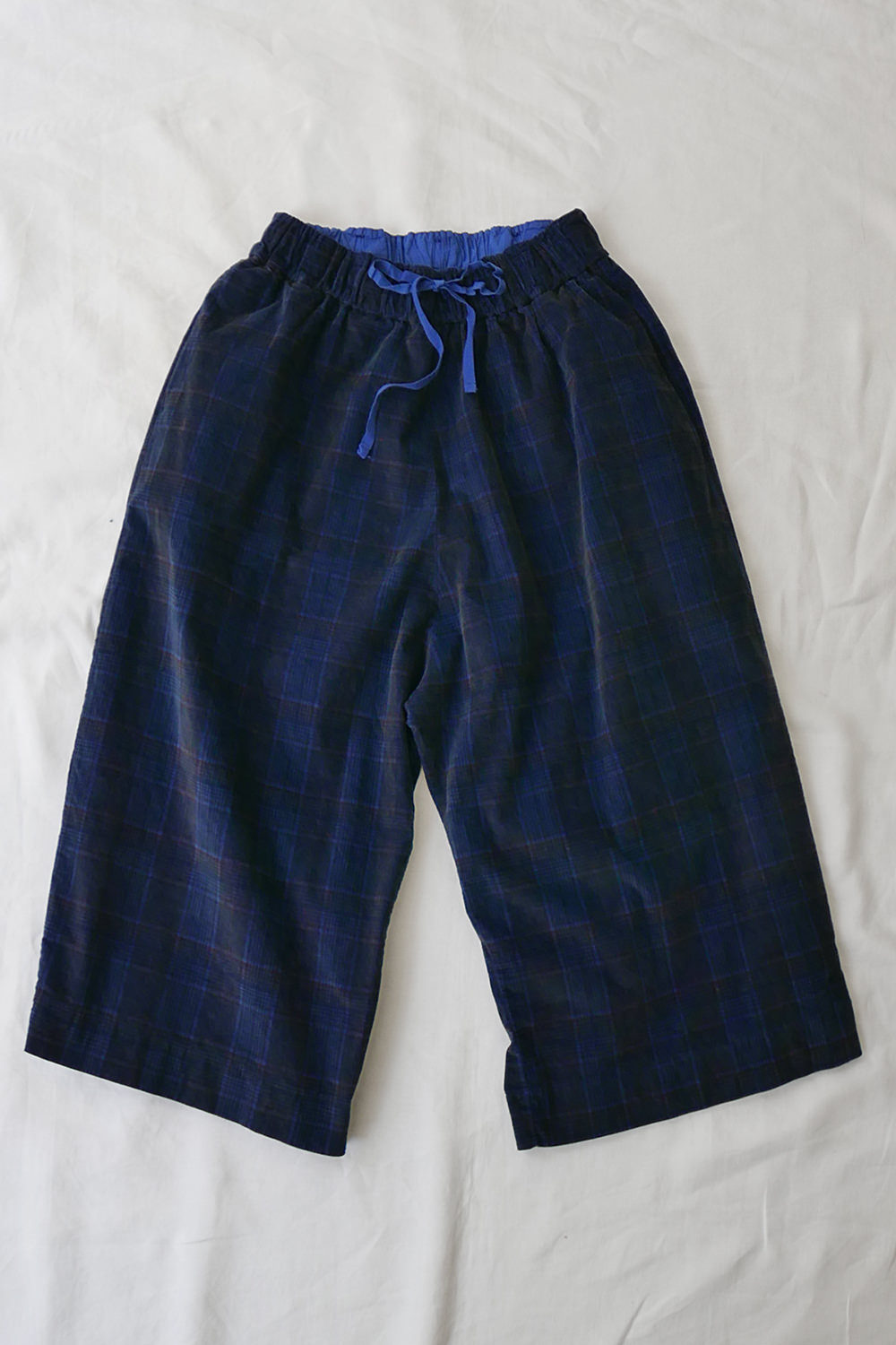 Album di Famiglia Wide Tartan Velvet Trousers in Navy Check - Makie. Main.