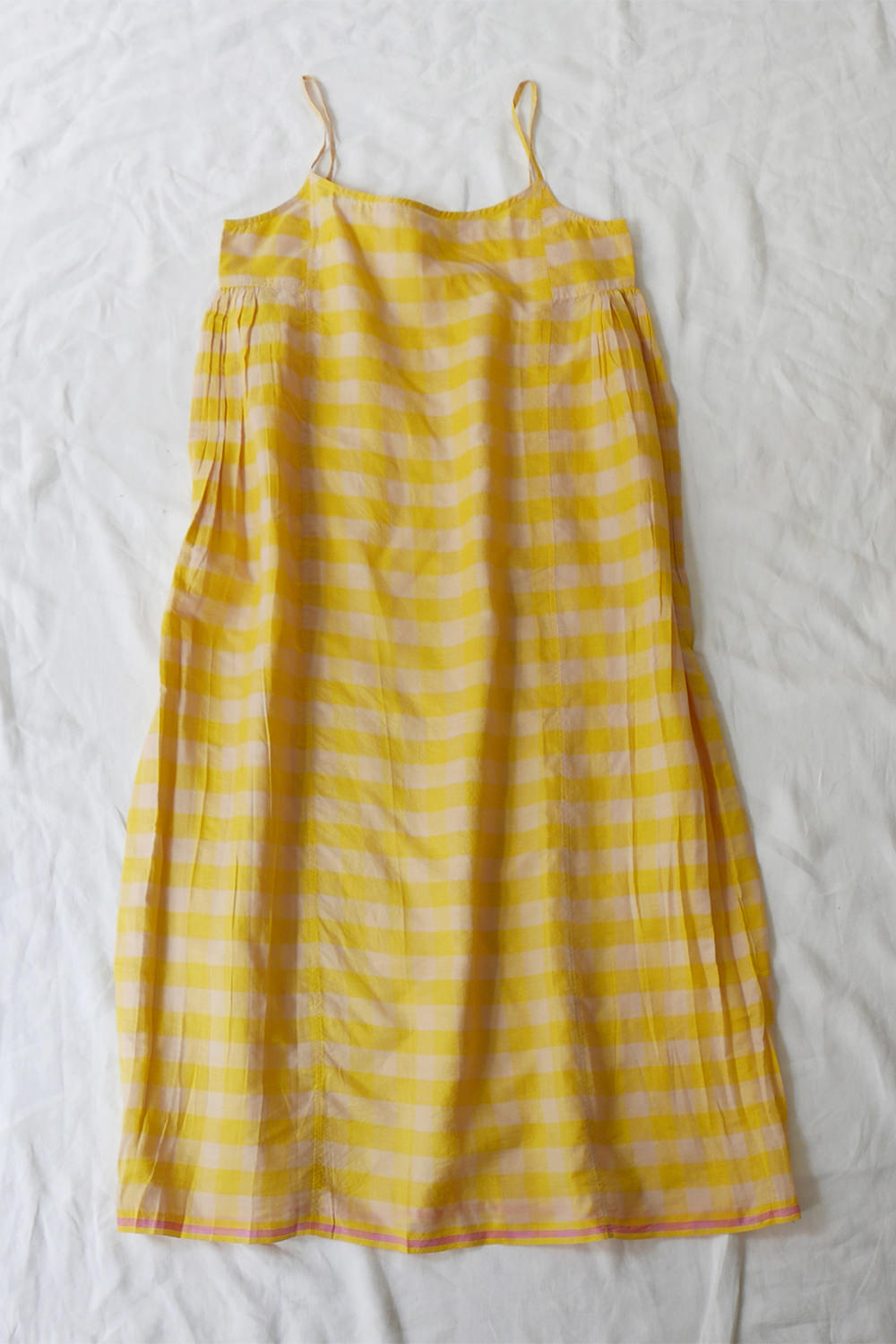 50% Silk, 50% Cotton. Made in India. Yellow check with pink line.