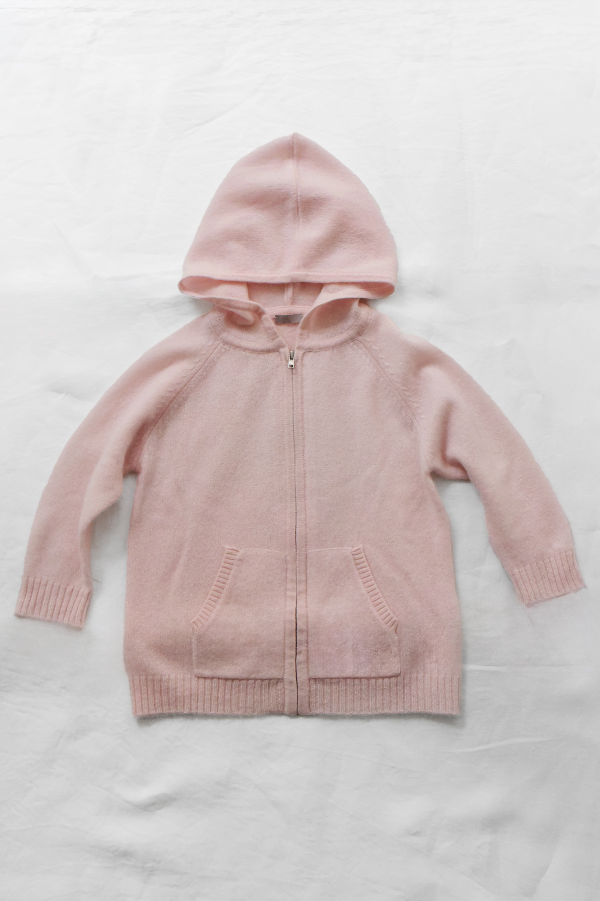 Pink cashmere zip-up hoodie with hood and front pockets