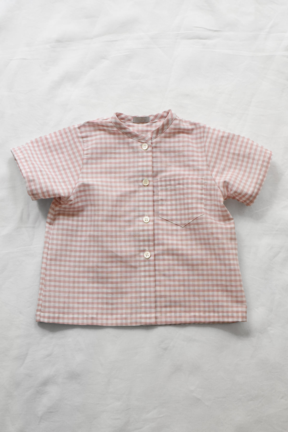 Italian gingham baby shirt in soft pink with short sleeves and front buttons