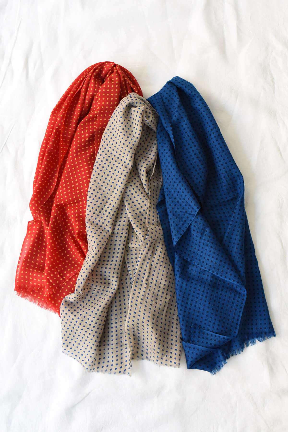 Lightweight cashmere polka dot scarf in red, taupe, and blue night