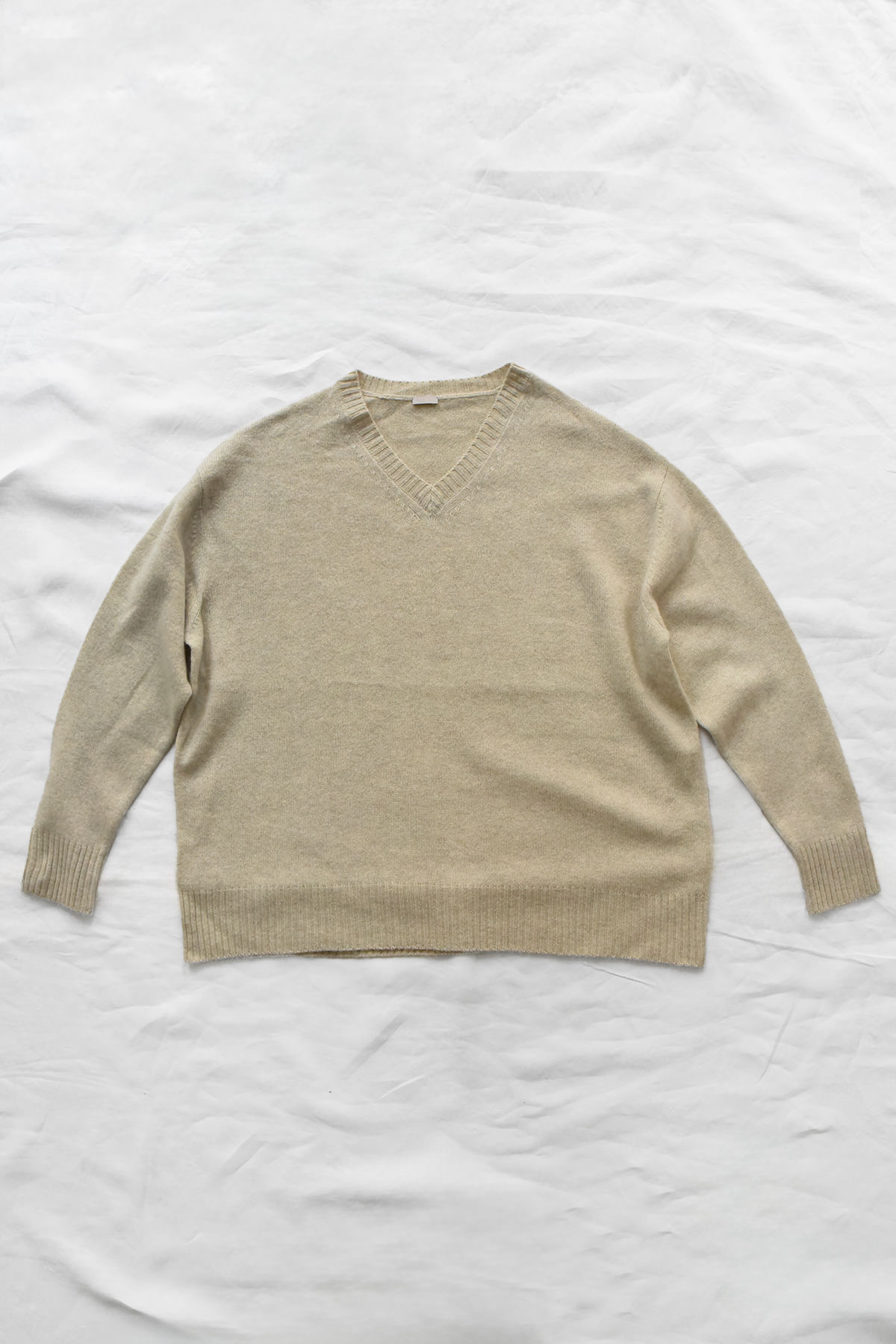Oversized V-neck sweater in 100% yak wool with tonal elbow patches