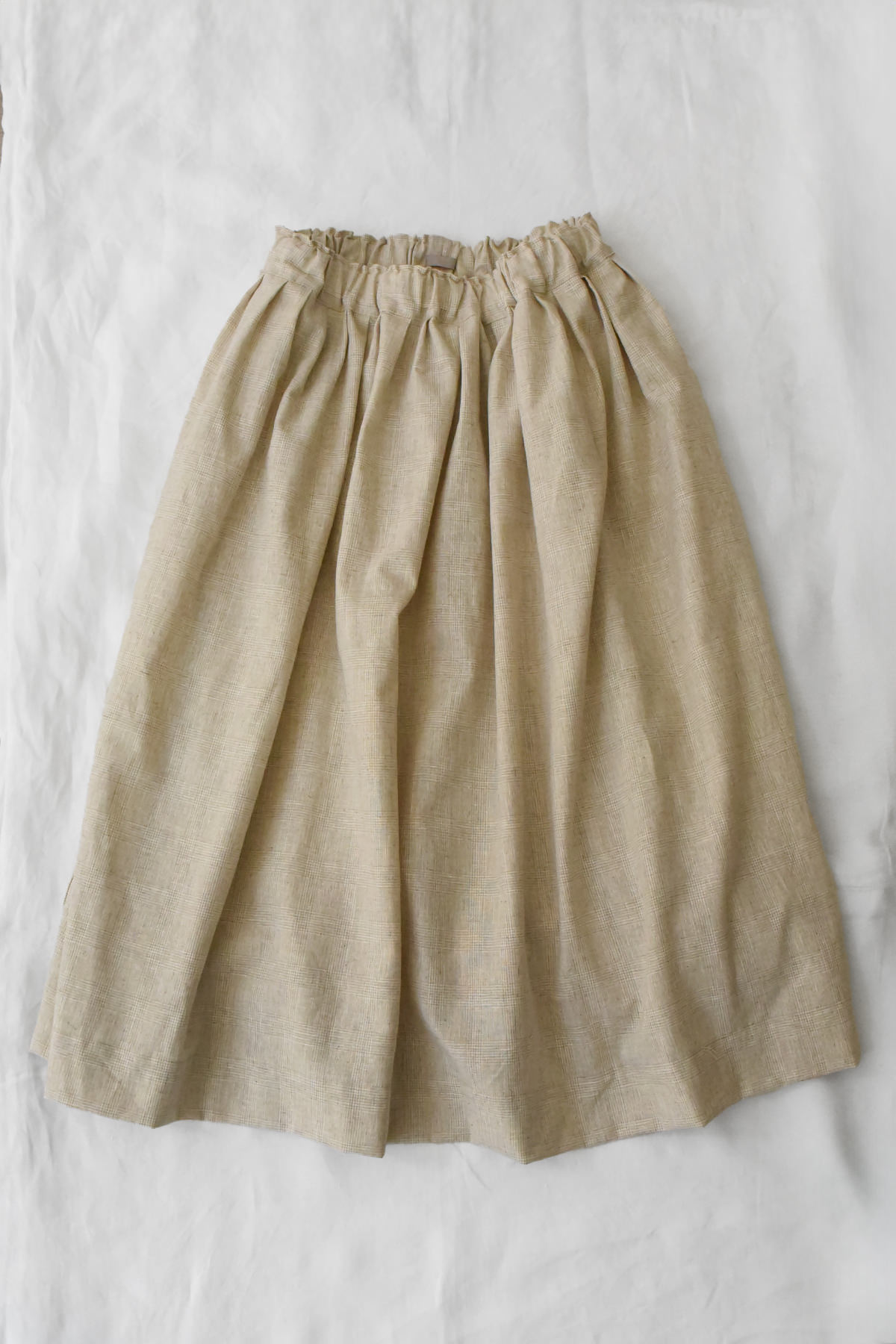 Women’s beige glen check skirt in 100% linen with elastic waist and side pockets