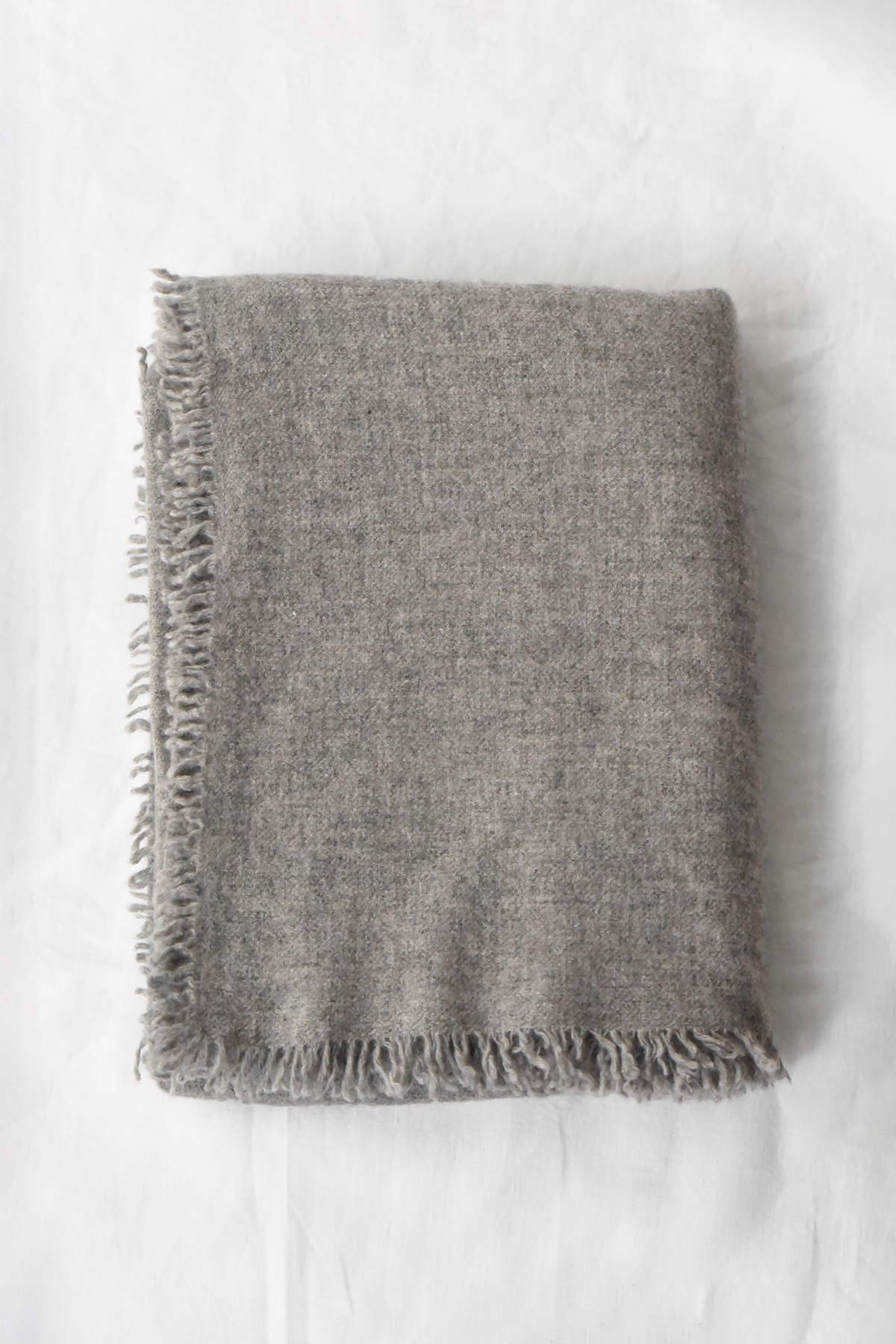 Oversized felted cashmere scarf 100 x 200 cm with soft brushed texture and frayed edges in neutral tones