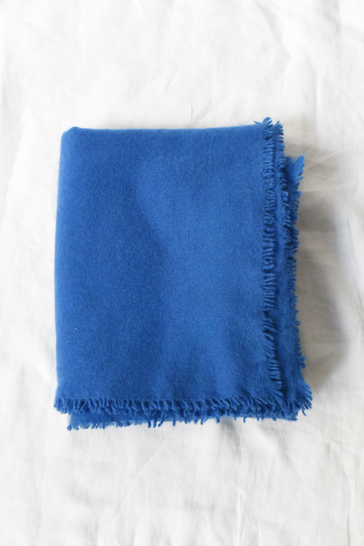 Oversized felted cashmere scarf 100 x 200 cm with soft brushed texture and frayed edges in neutral tones