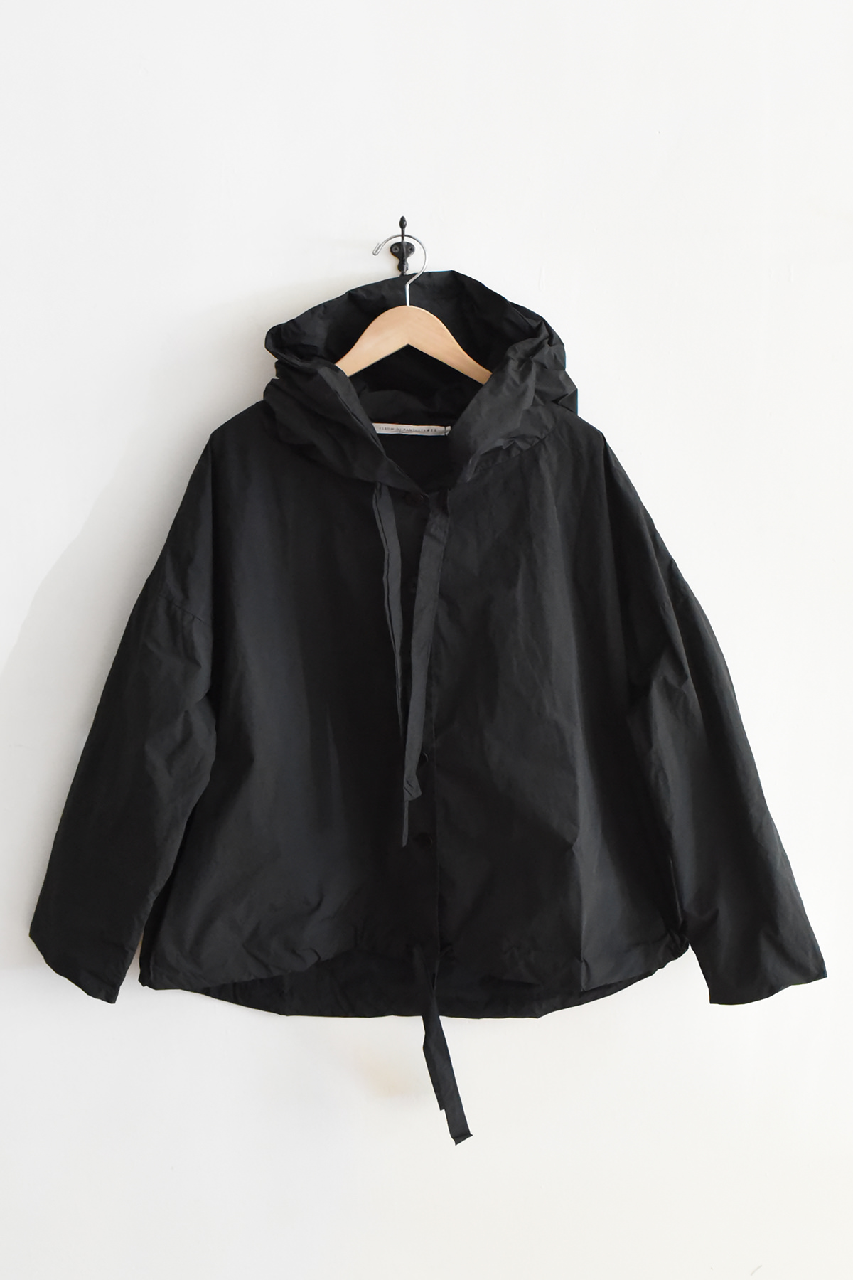 Album di Famiglia black hooded jacket with drawstring hood and hem button front made in Italy