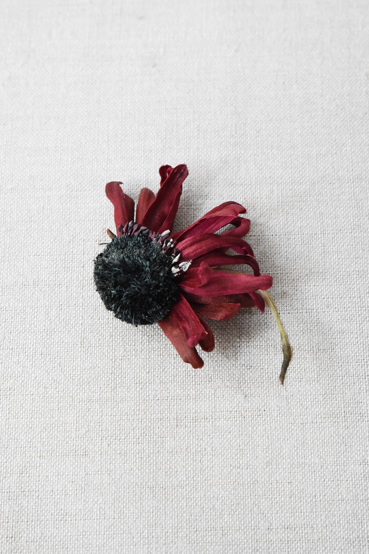 red fabric flower brooch approximately 2-3 inches