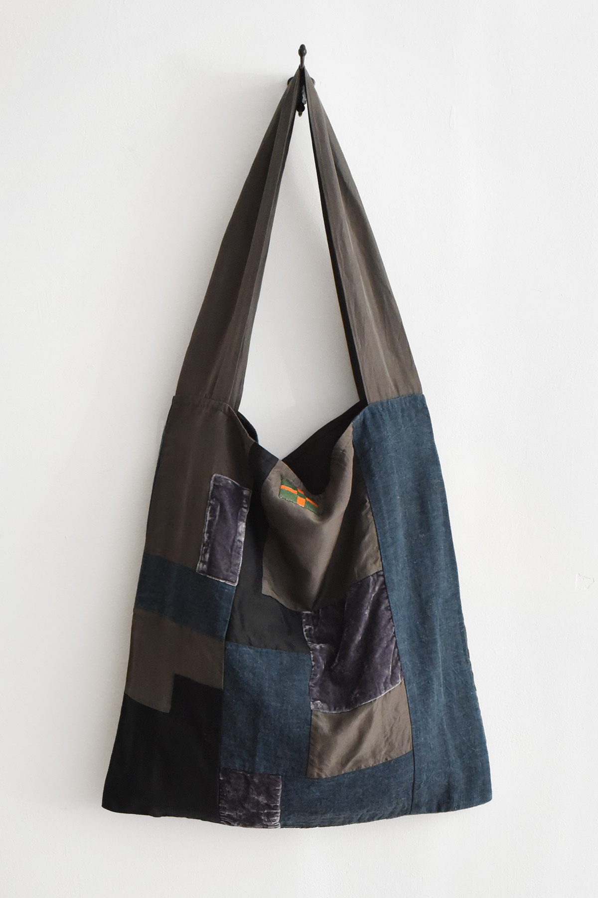 Aodress sumi patchwork shoulder bag in silk, cotton, and linen with charcoal, indigo, and black fabric panels