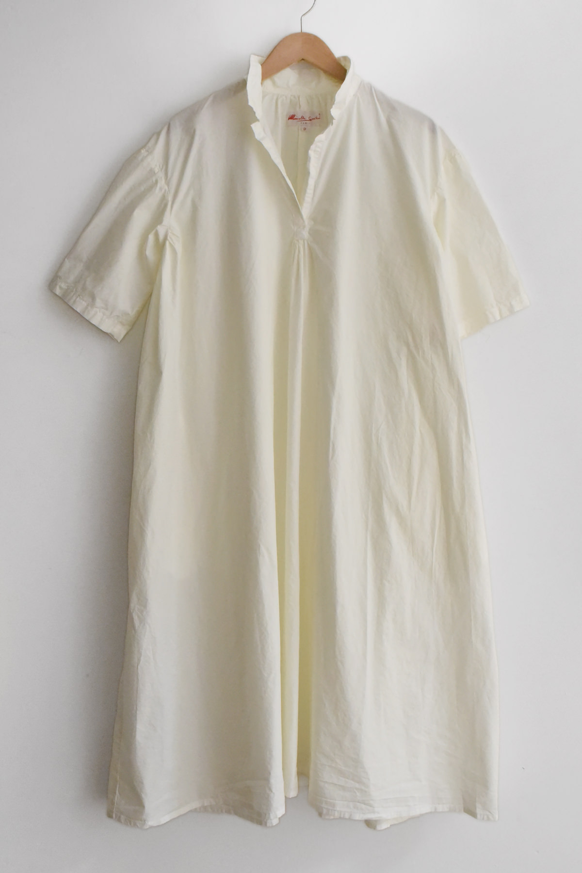 white cotton shirt dress short sleeve with collar and side pockets front view