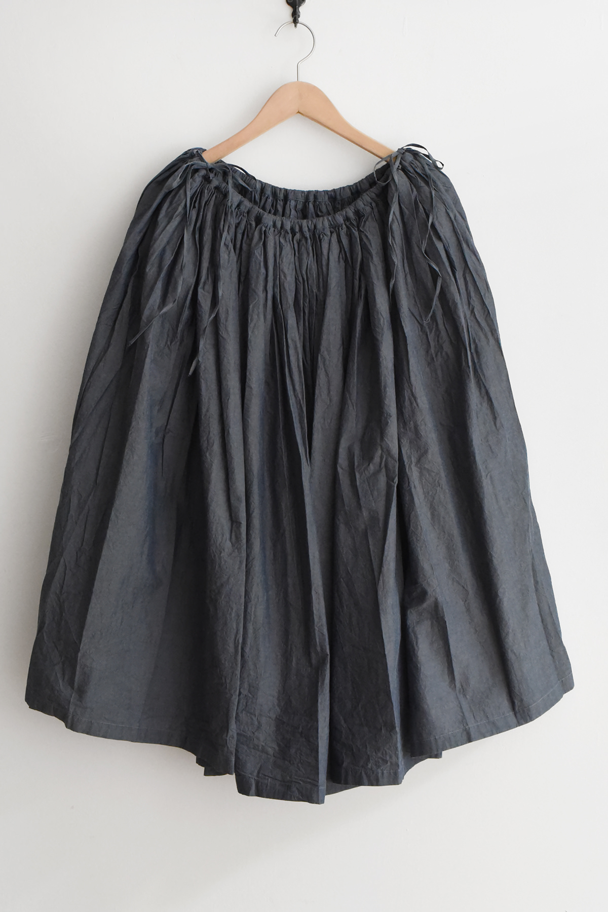 dark blue cotton gathered skirt elastic waist with side ties front view