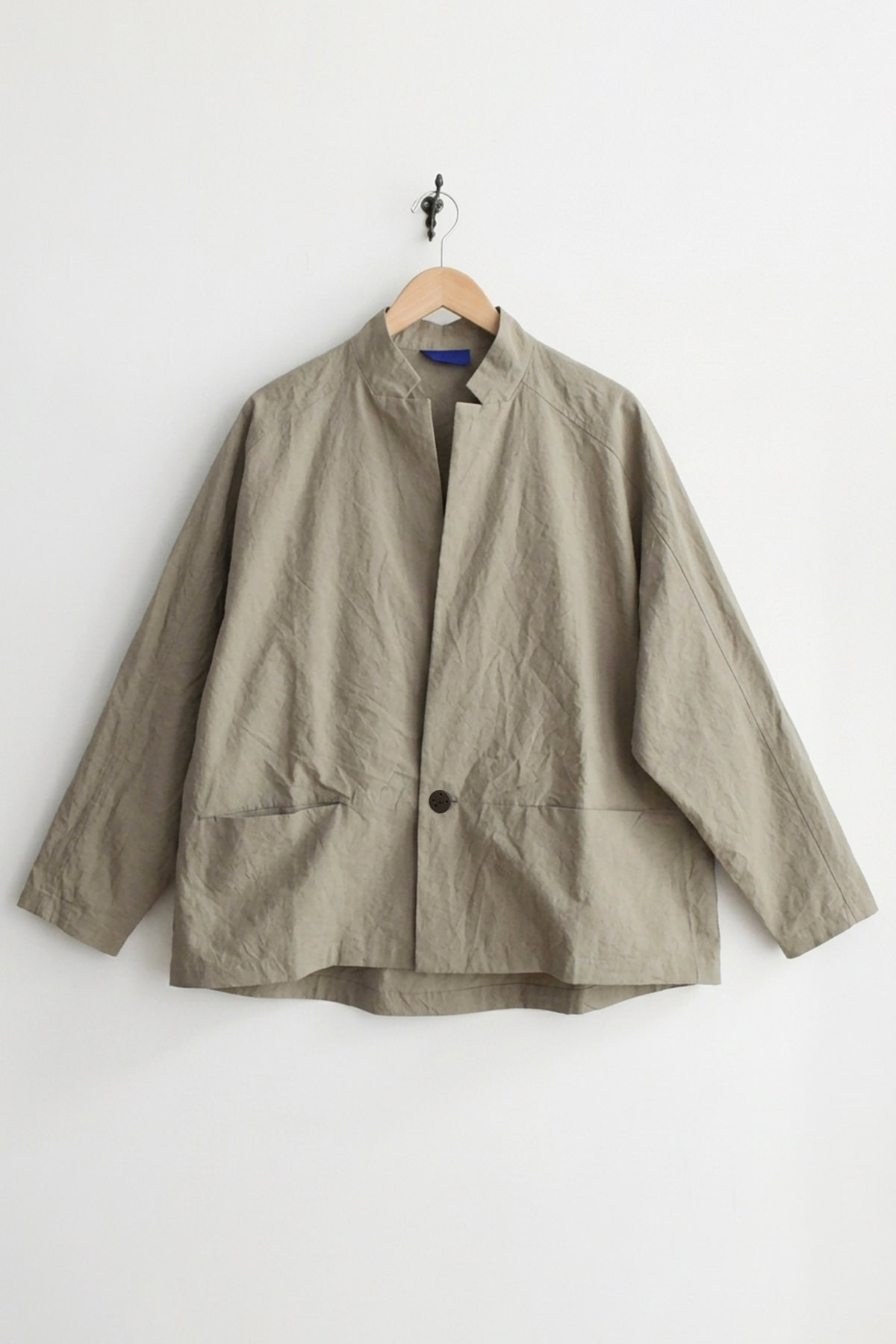 Oyuna Absent oversized cotton jacket in Japanese woven cotton with raglan sleeves and single button closure