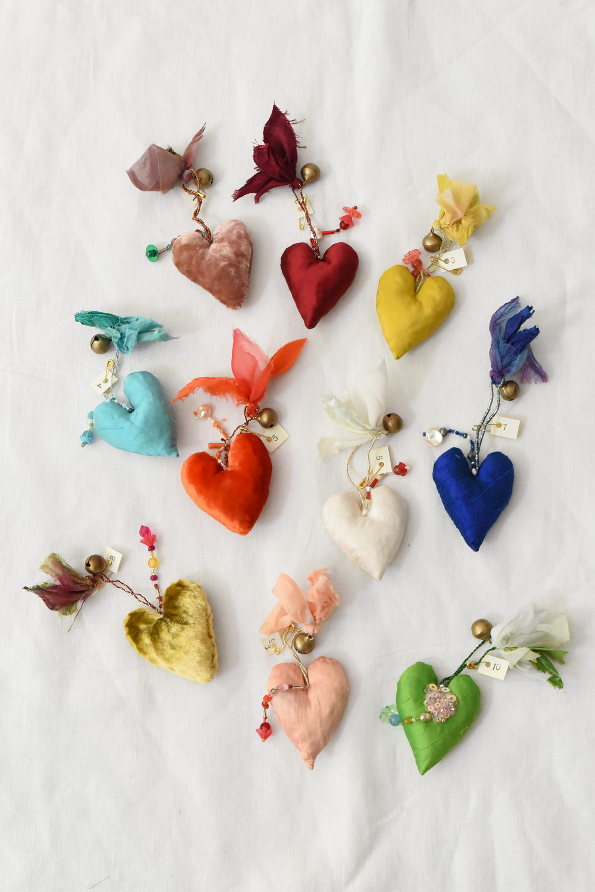 embroidered heart ornament with vintage Venetian beads