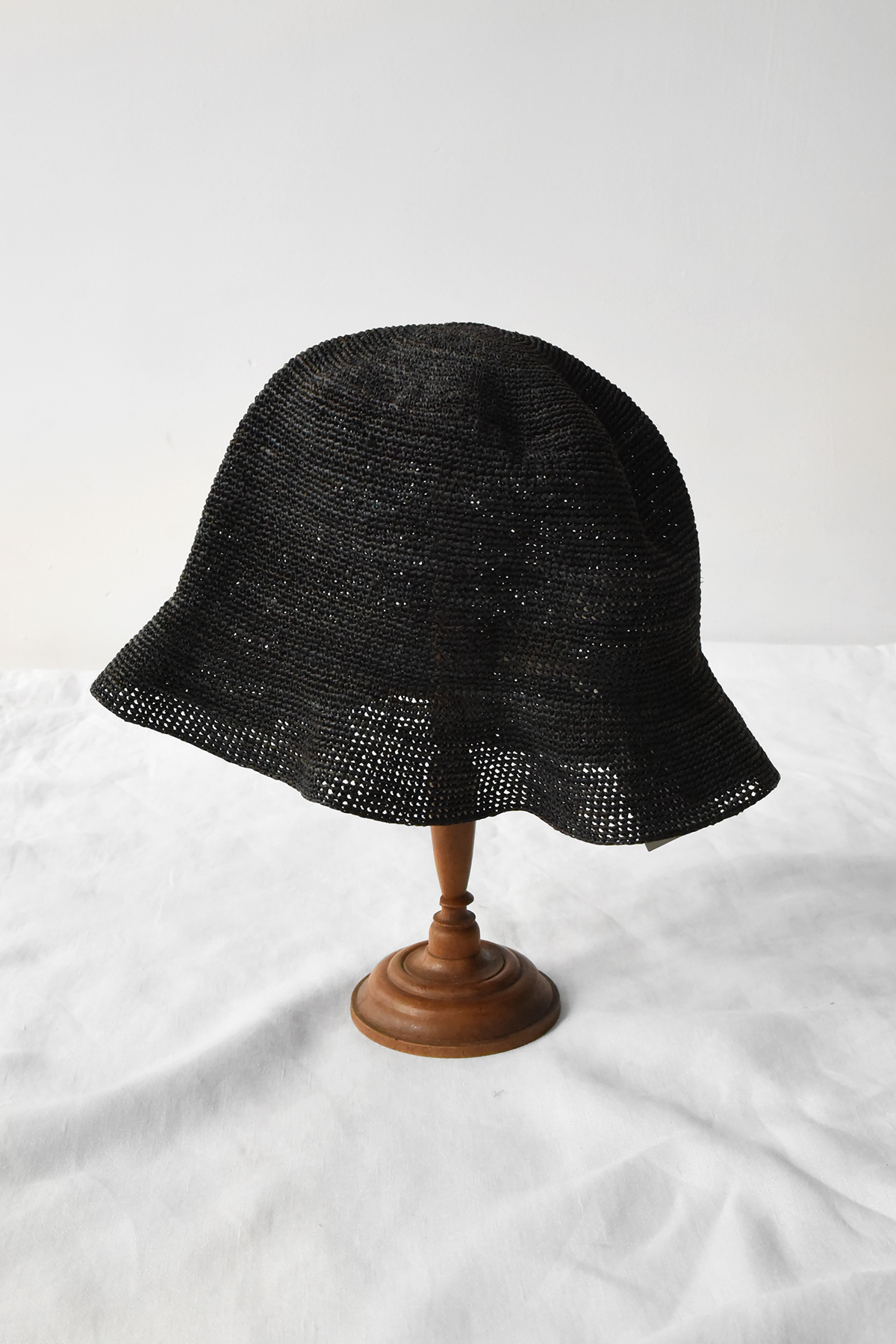 Hand crocheted raffia bucket hat with soft crown and short flexible brim