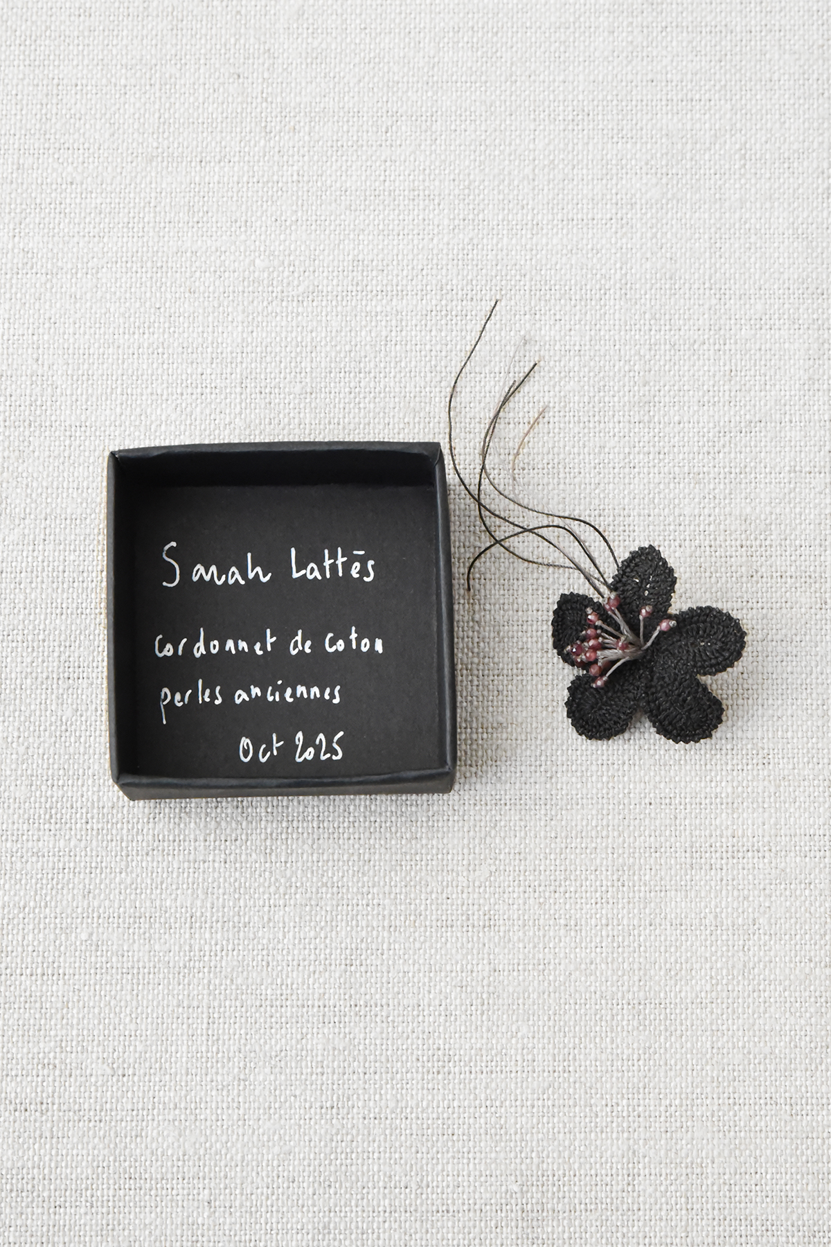 Handmade cotton flower pin brooch with antique beads by Sarah Lattés