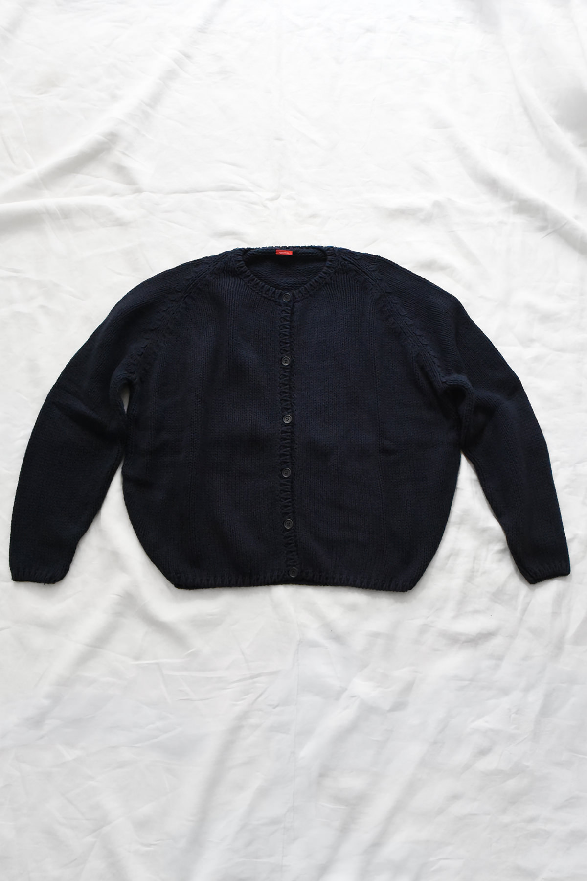 Apuntob abyss navy silk knit cardigan front view