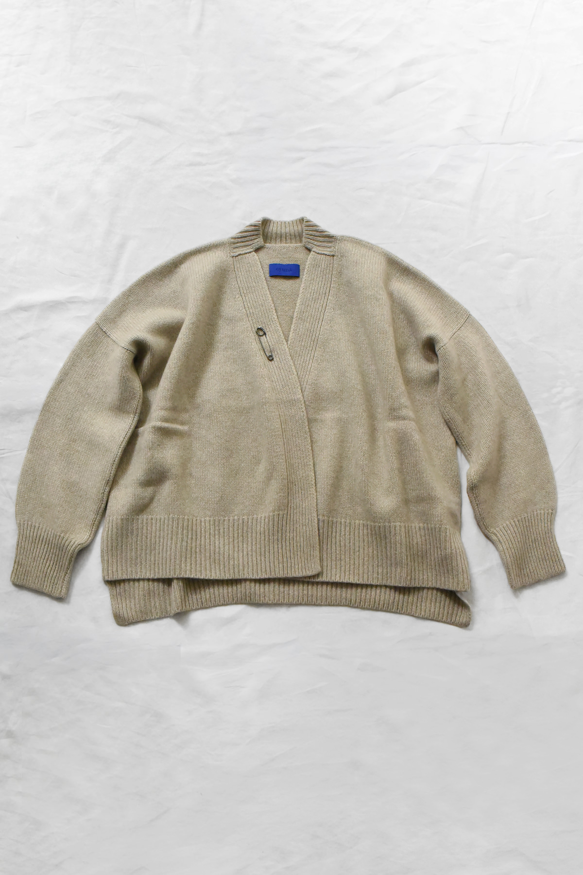 Oyuna Aire open front knit cardigan in Feather with removable pin closure and relaxed silhouette