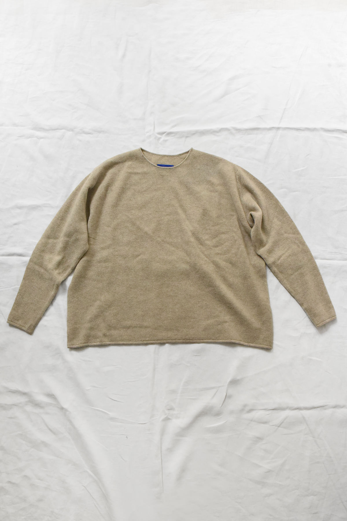 Oyuna Bagi cropped micro moss stitch sweater with relaxed boxy silhouette