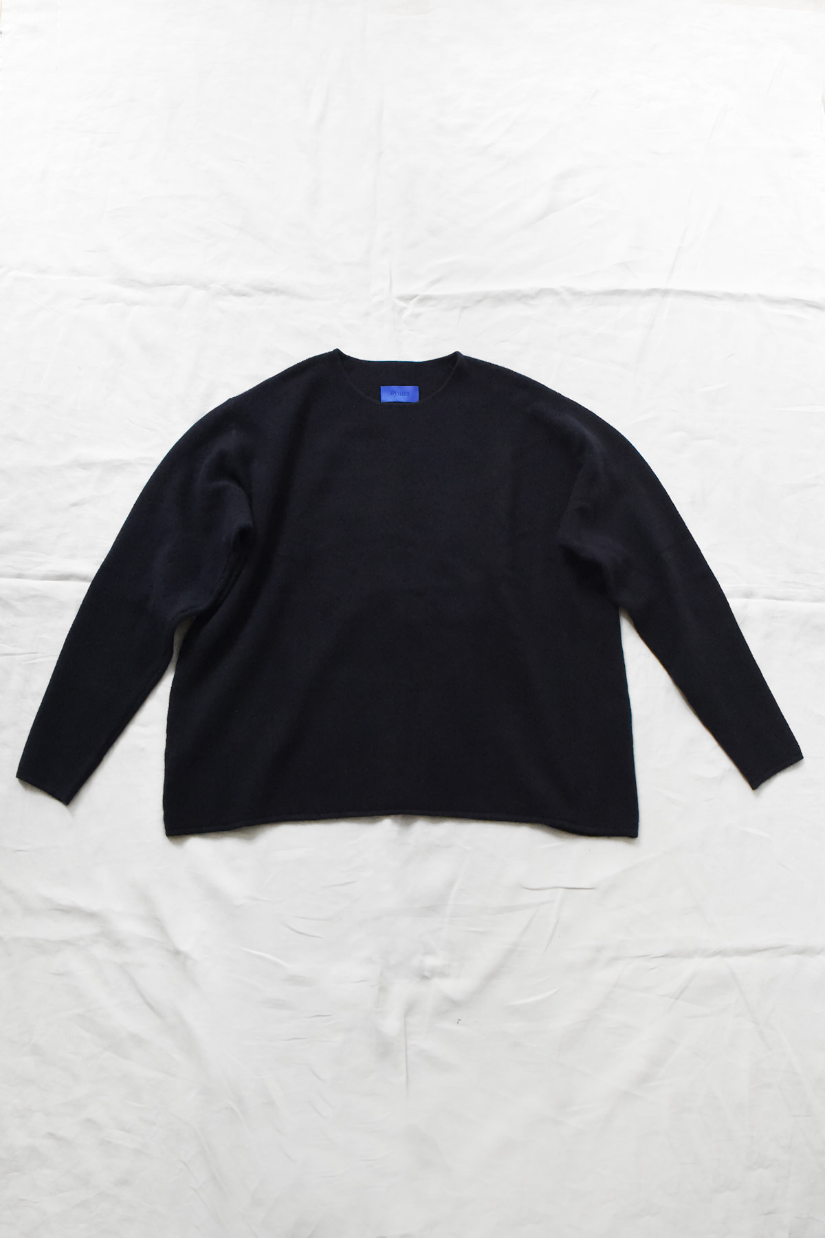 Oyuna Bagi cropped micro moss stitch sweater with relaxed boxy silhouette