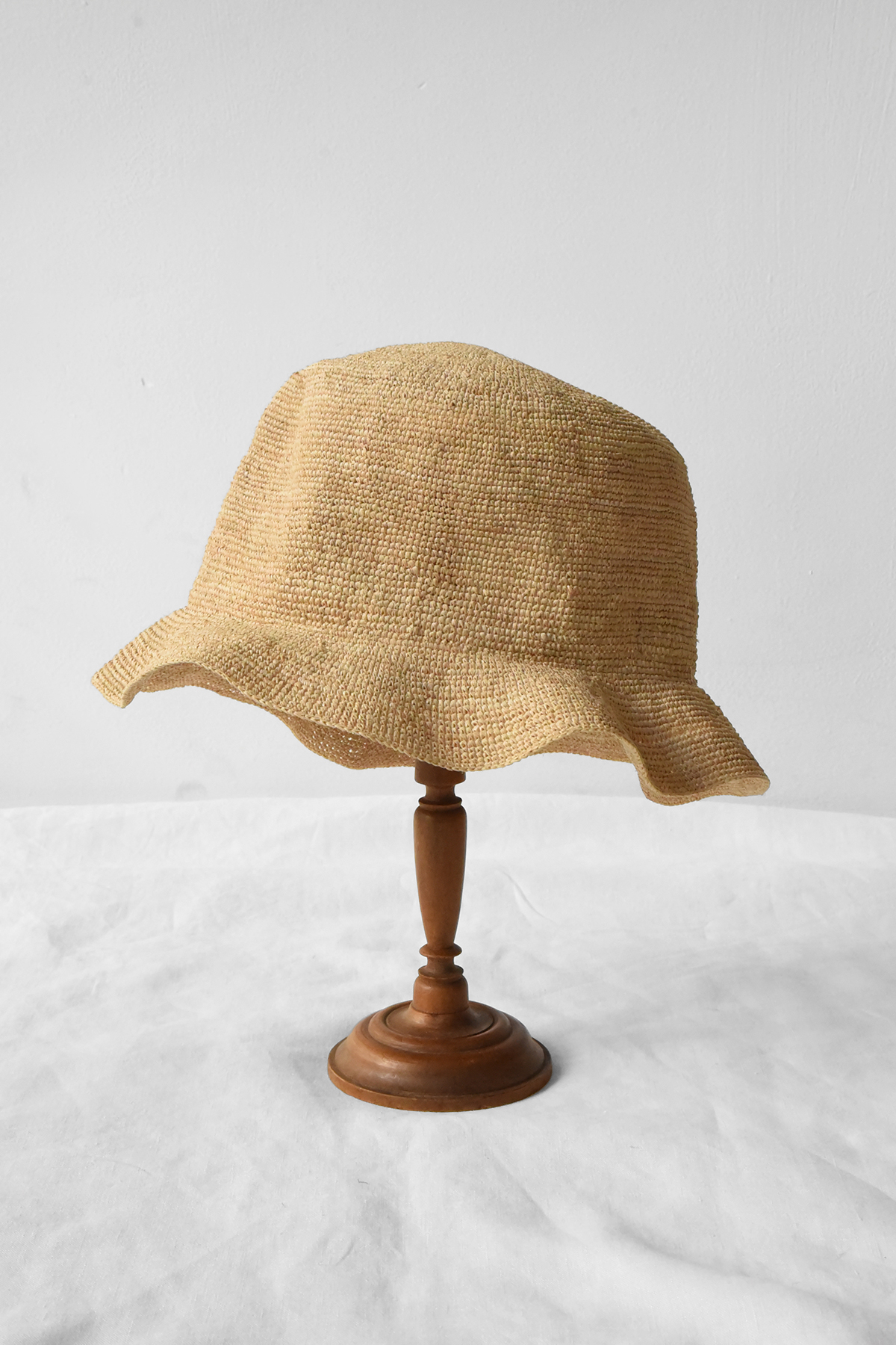 Hand crocheted raffia bucket hat with soft crown and short flexible brim
