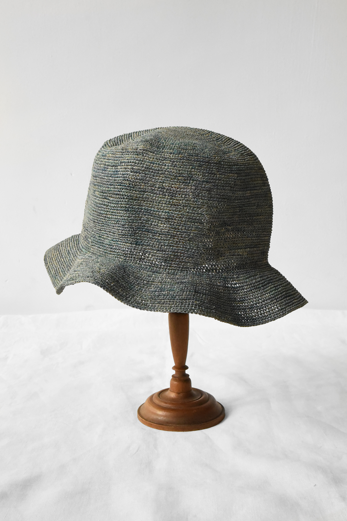 Hand crocheted raffia bucket hat with soft crown and short flexible brim