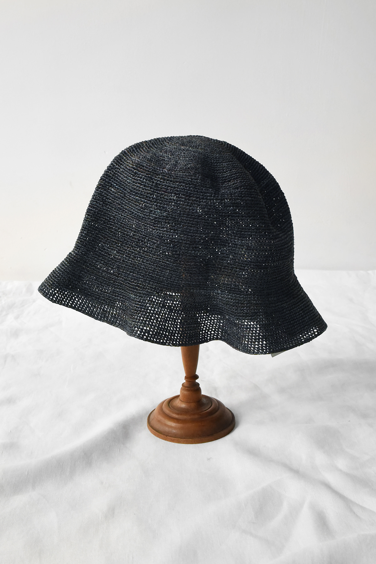 Hand crocheted raffia bucket hat with soft crown and short flexible brim
