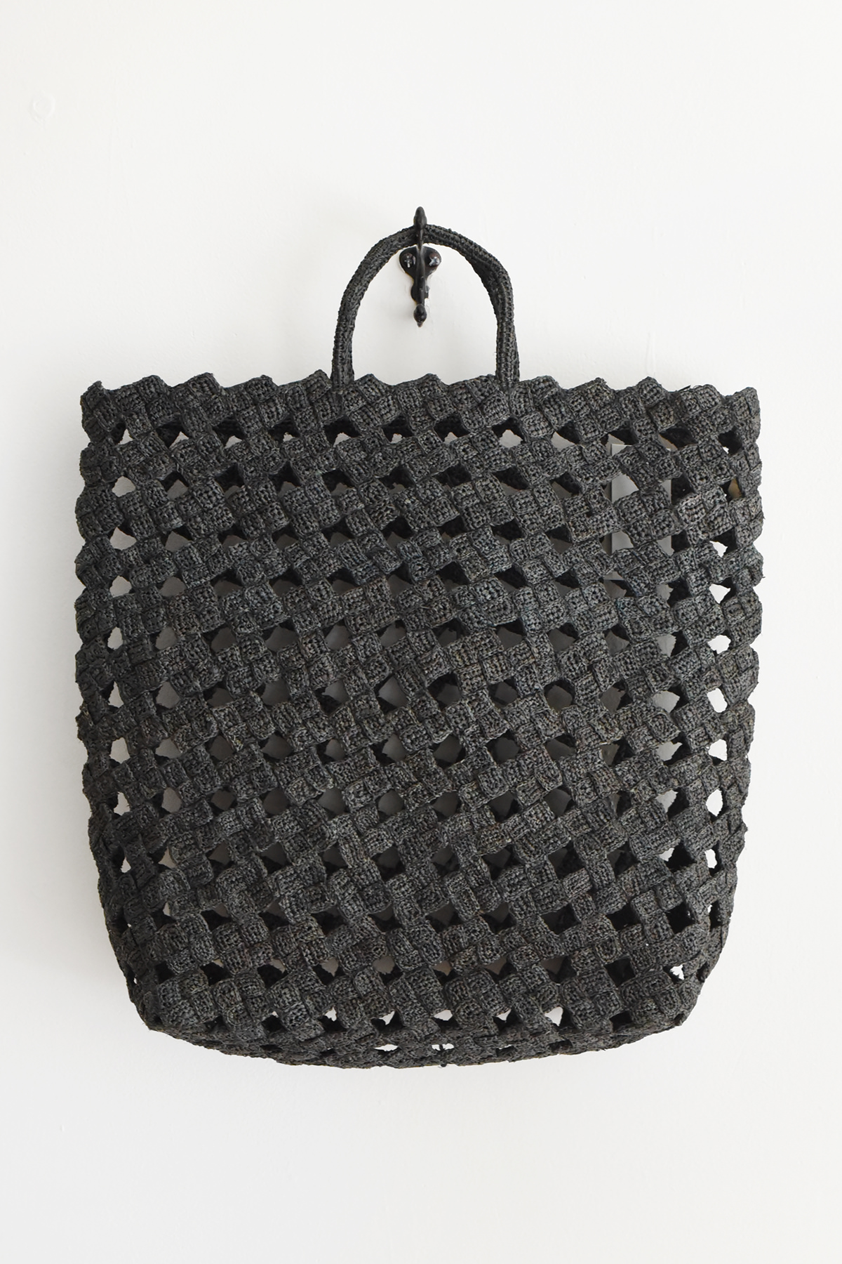 Handmade raffia lattice tote crafted in Madagascar