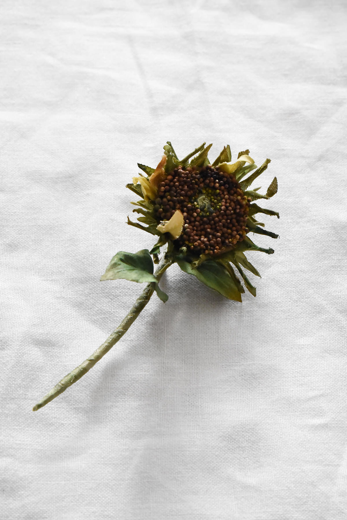 Hand-painted silk sunflower seed head with textured brown center by Japanese artist Hitoyo