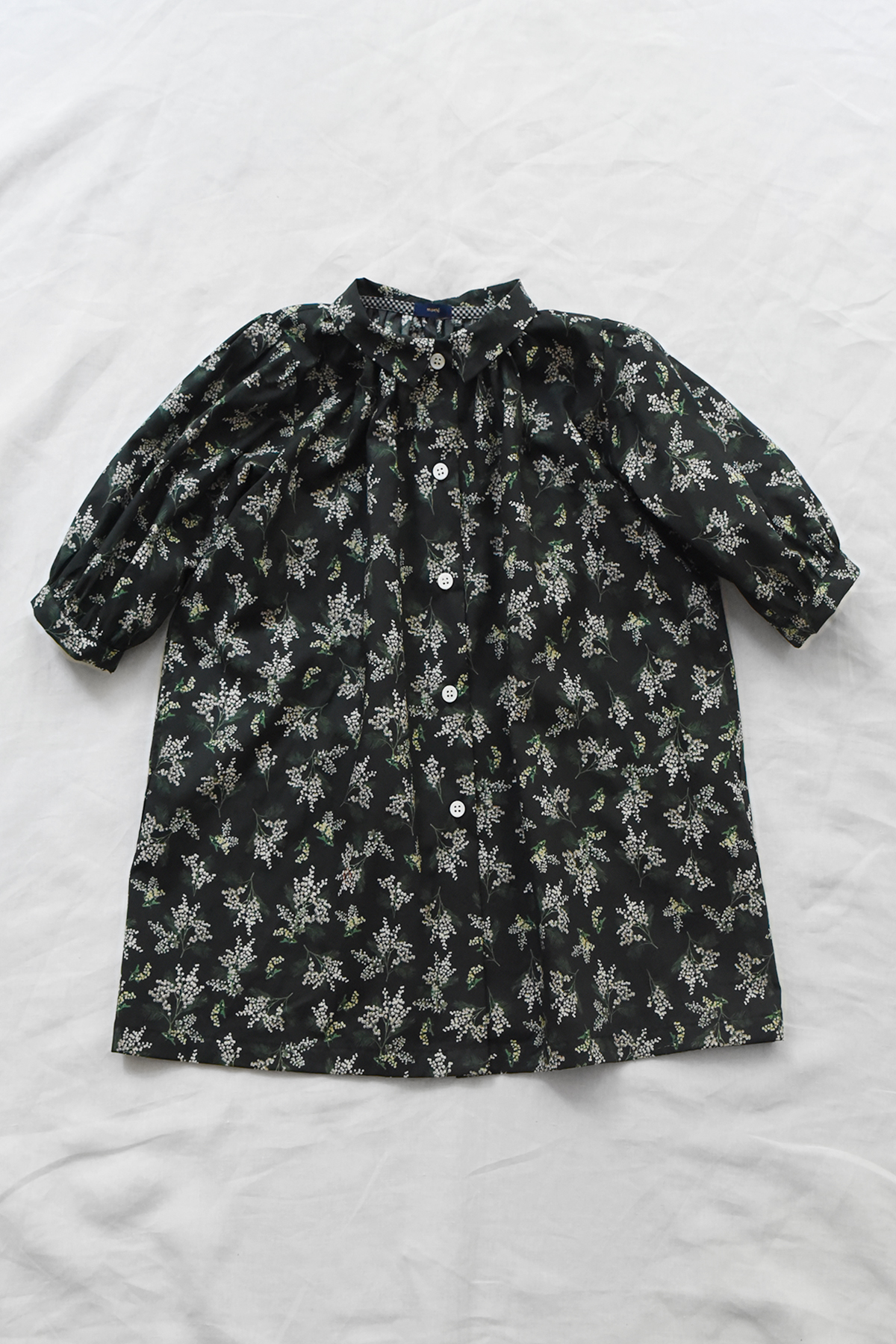 Kids black Mimosa cotton dress with pointed collar and gathered neckline