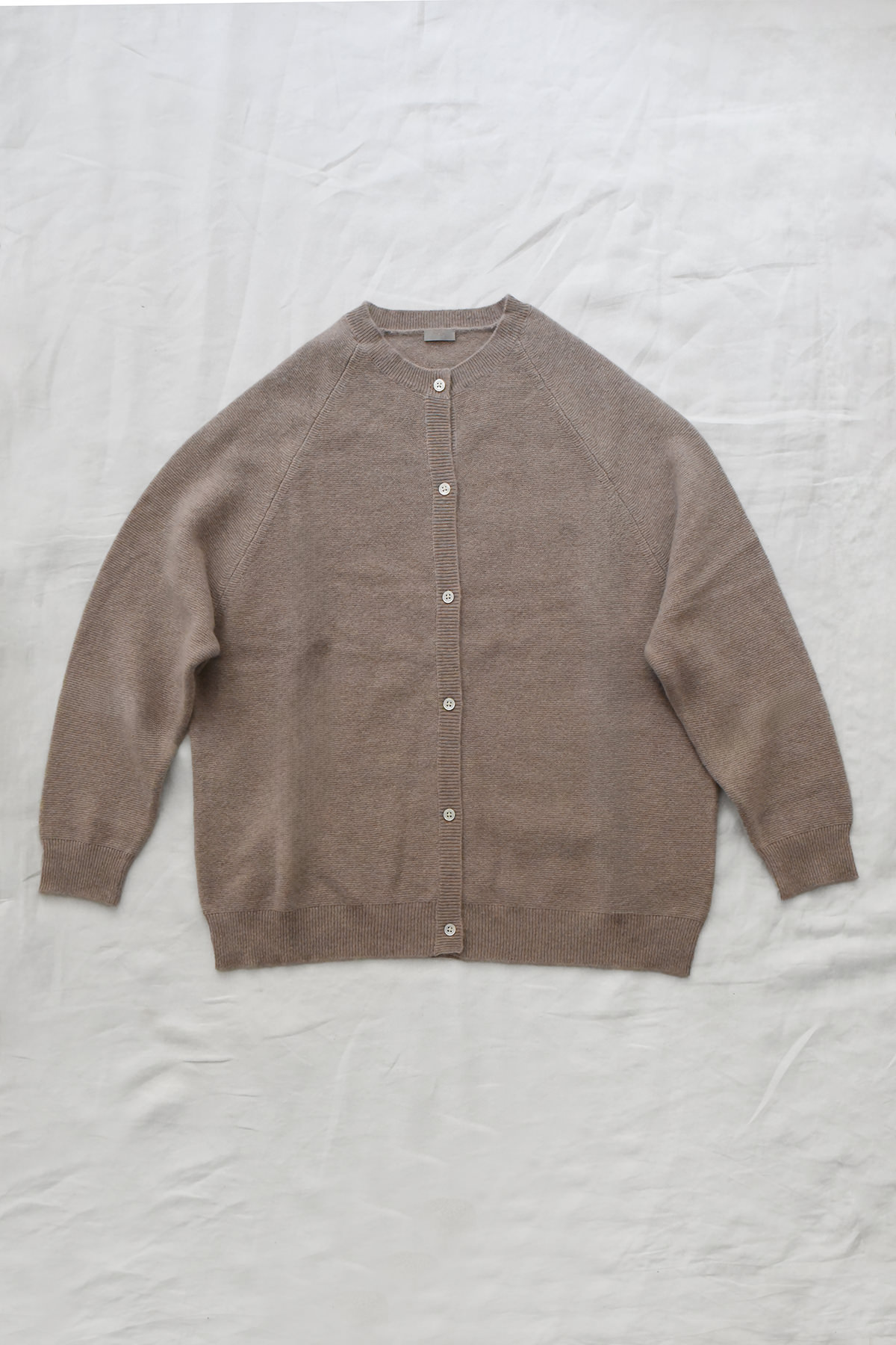 Women's oatmeal cashmere raglan cardigan with crew neck, front button closure, and ribbed trims