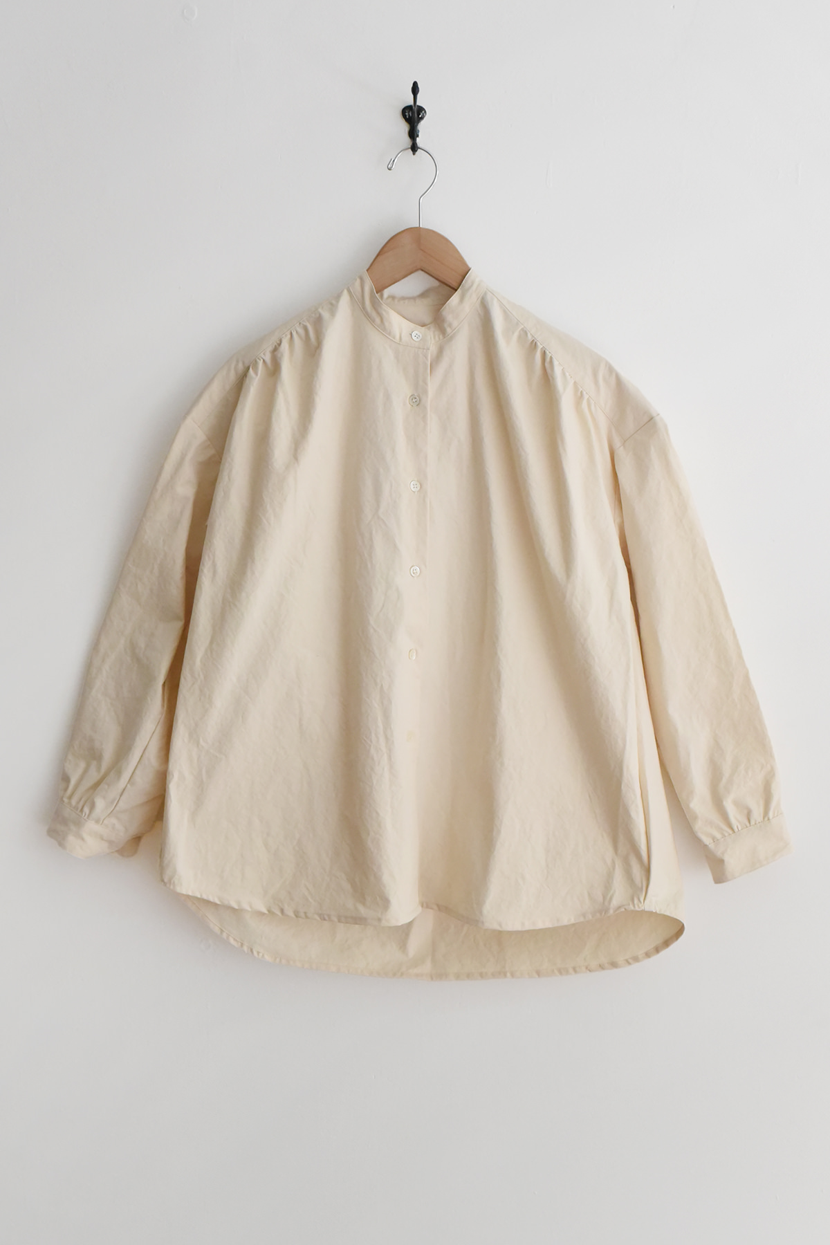 ivory stand collar cotton blouse with slightly loose fit