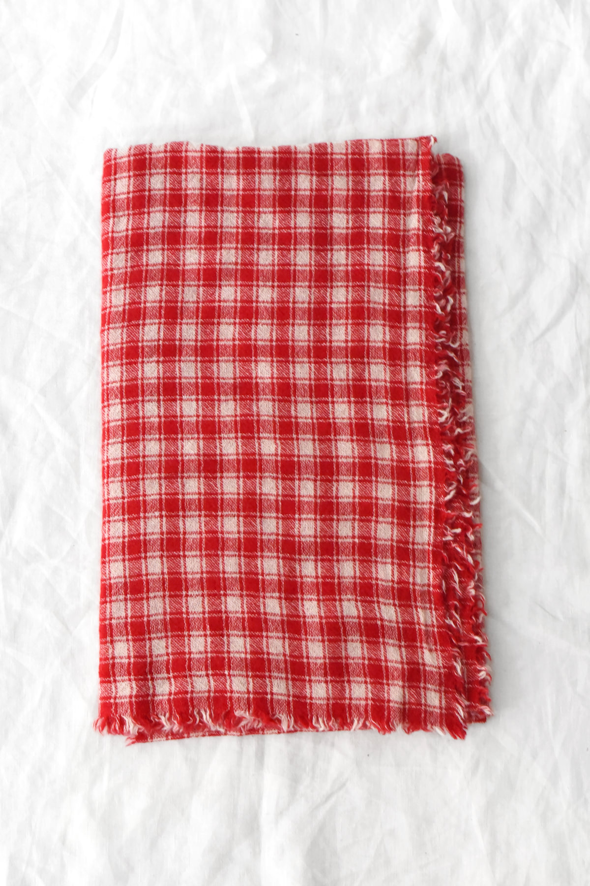 Fine check cashmere scarf with fringed edges