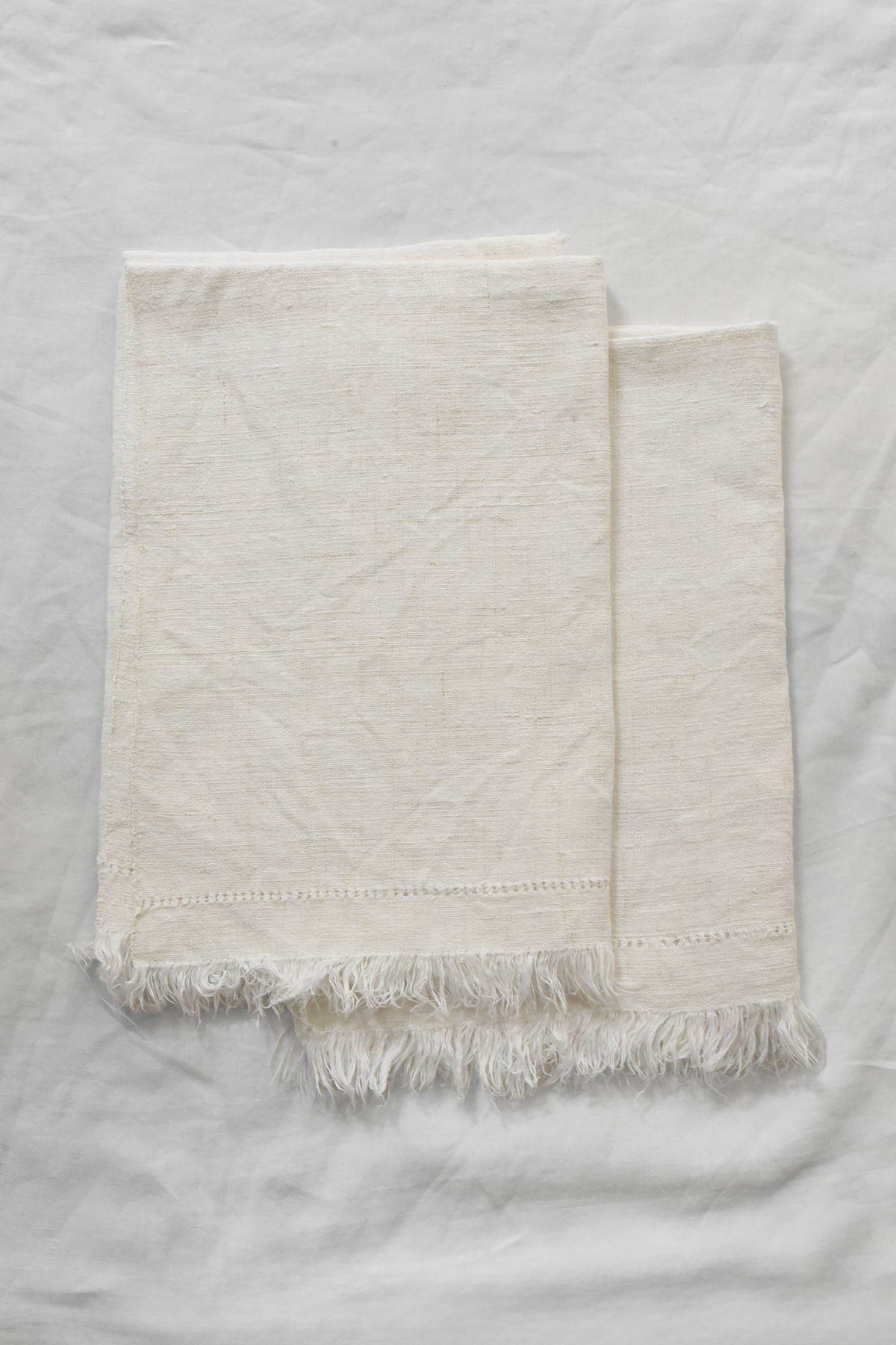 Hand embroidered vintage linen napkin with floral corner embroidery by Antonia Rossi