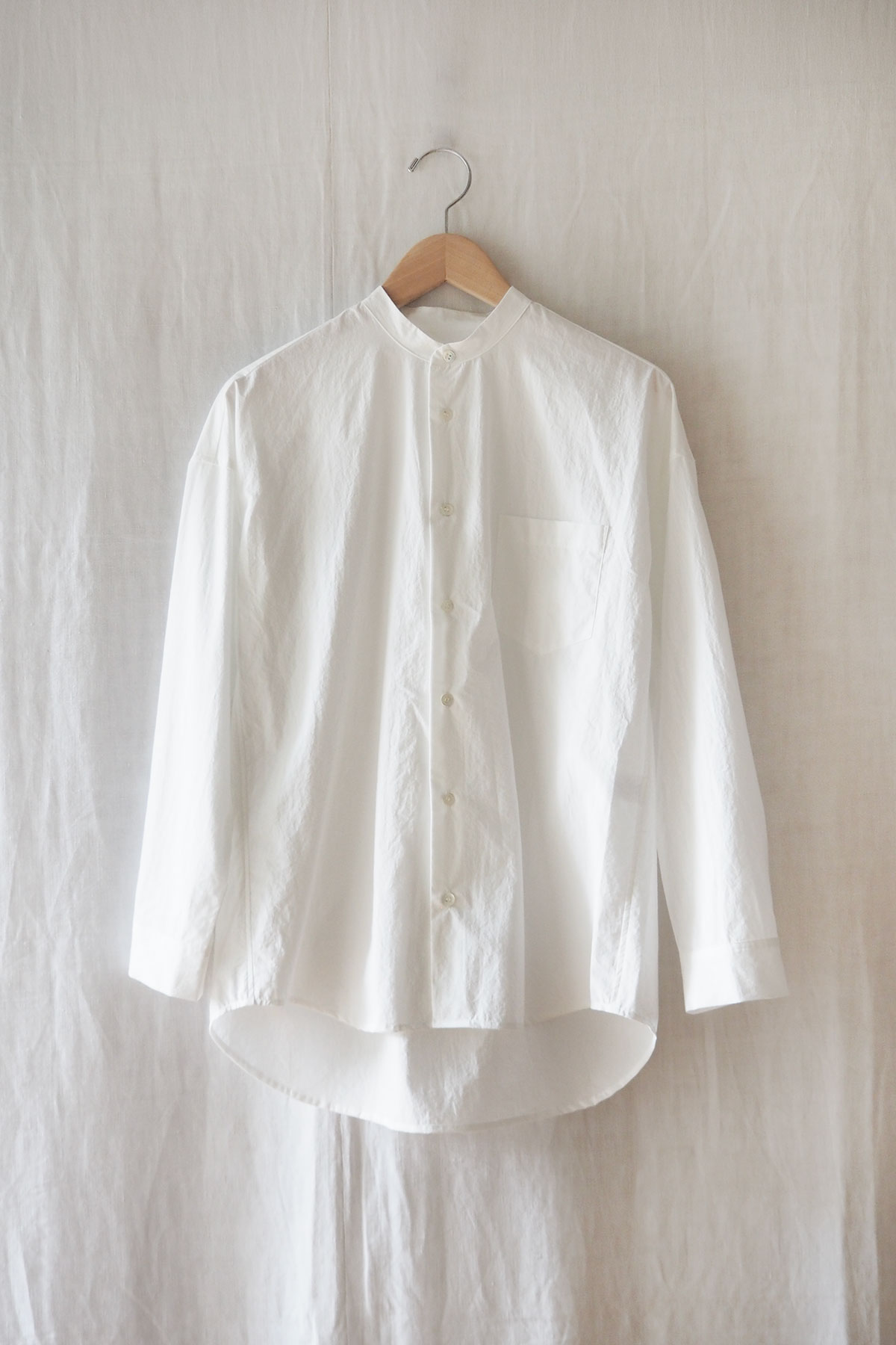 Stand collar and button front of cotton white shirt