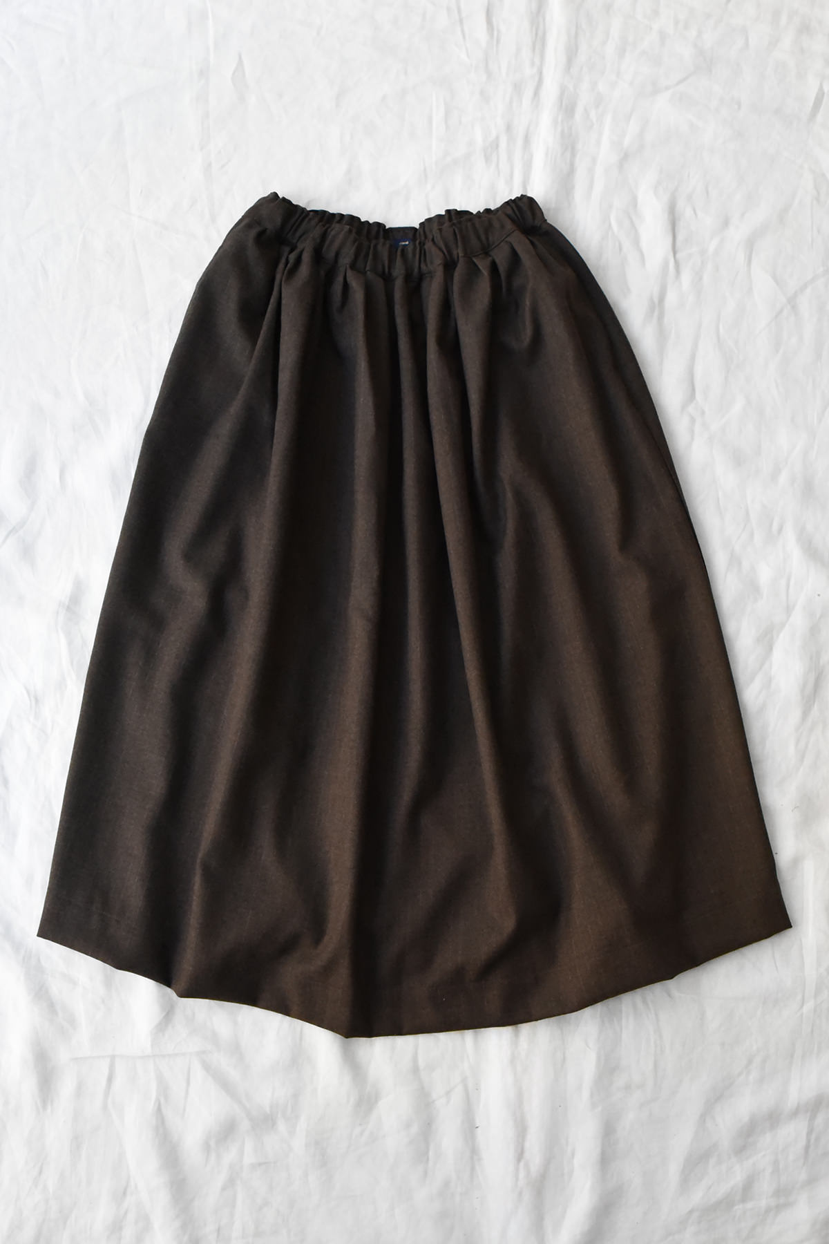 100% wool pleated skirt in brown pinstripe