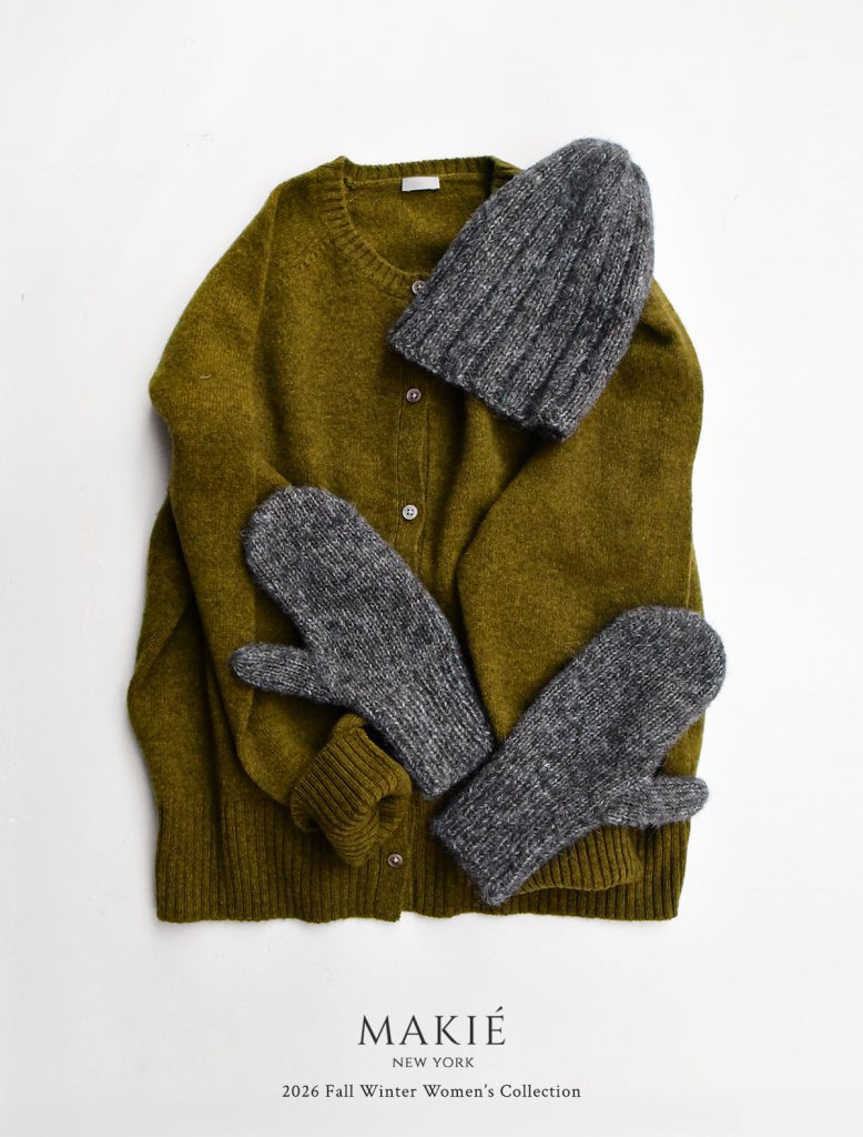 Olive green cardigan, grey knit beanie, and grey knit mittens on a white background, with text reading MAKIÉ NEW YORK 2026 Fall Winter Womens Collection.